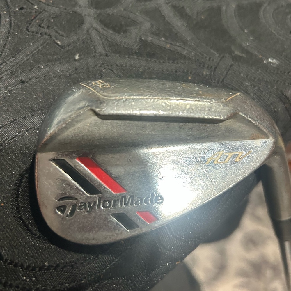 TaylorMade Silver pitching Wedge with Red and Black Accents